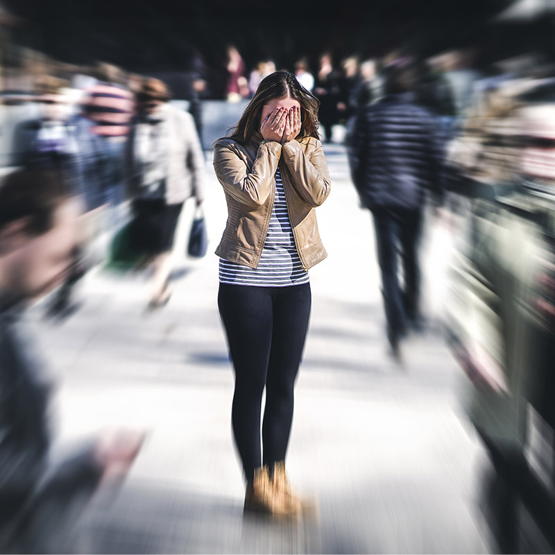 woman scared with people around